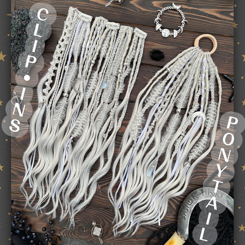 A new arrival – READY TO SHIP! Opaline Moon Clip-Ins OR XL-Ponytail. Pearl Platinum Blonde - Perfect for graying hair and blondes, while also creating a beautiful contrast with dark hair! Includes decorated dreads and braids with brushable curl ends. Decorated with real stones - Opal and Moonstone, various moons and crescents, hair Tinsel, ribbons. CLIPS615