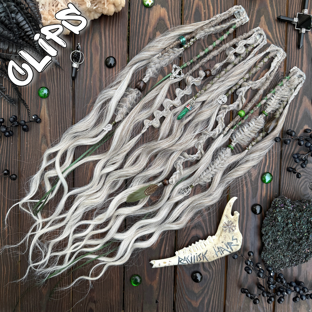 A new arrival – READY TO SHIP! Ashen Forest CLIP-INS or/and XL PONYTAIL. Brushable Curls, roots: Dreads & textured Braids in Ash Blonde mix. Perfect for grey and blonde hair – or for adding a bold contrast to dark hair! Decorated in Woodland Forest style with natural Malachite gemstone, deer, mushrooms, leaves, feathers, finished with lush moss-green accents. CLIPS681